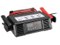 Car battery charger with jump leads and digital display.