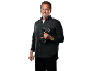 Bearded man in a dark shirt holding a cordless drill.