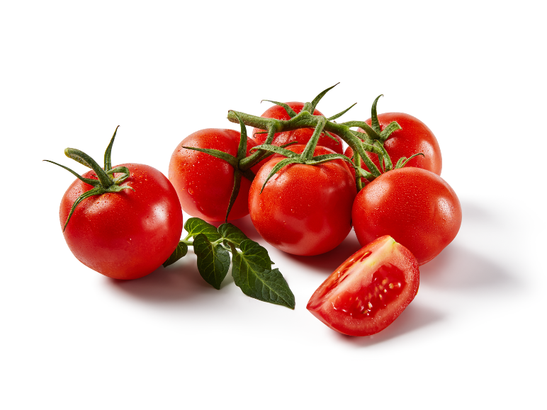 Fresh red cherry tomatoes on the vine with one sliced, on a white background.