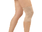 Legs with a flesh-colored compression knee brace