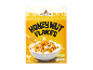 Honey Nut Flakes cereal box with a bowl of cereal and milk, 500g.