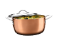 Copper pot with a metal lid, filled with diced vegetables