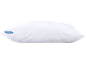 White pillow with a blue label featuring a bubble pattern and partially visible text.