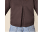 Woman in dark brown shirt and blue jeans, back view.