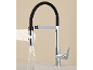 Chrome kitchen tap with black flexible spout and pull-out spray head.