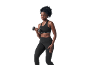 Woman in black sports bra and leggings lifting a dumbbell.