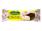 Glazed curd cheese bar with condensed milk flavour, with apple blossoms.