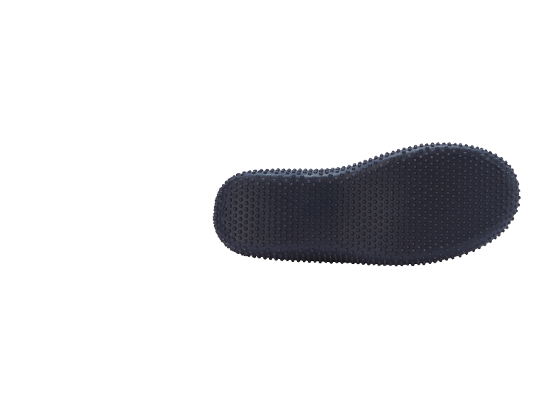 Shoe sole with a textured surface of small nubs on a black background.