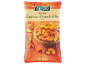 Roasted cashew-peanut mix with chili in a wooden bowl on a wooden table.