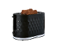 Black toaster with a hexagonal design and two slices of whole grain bread.