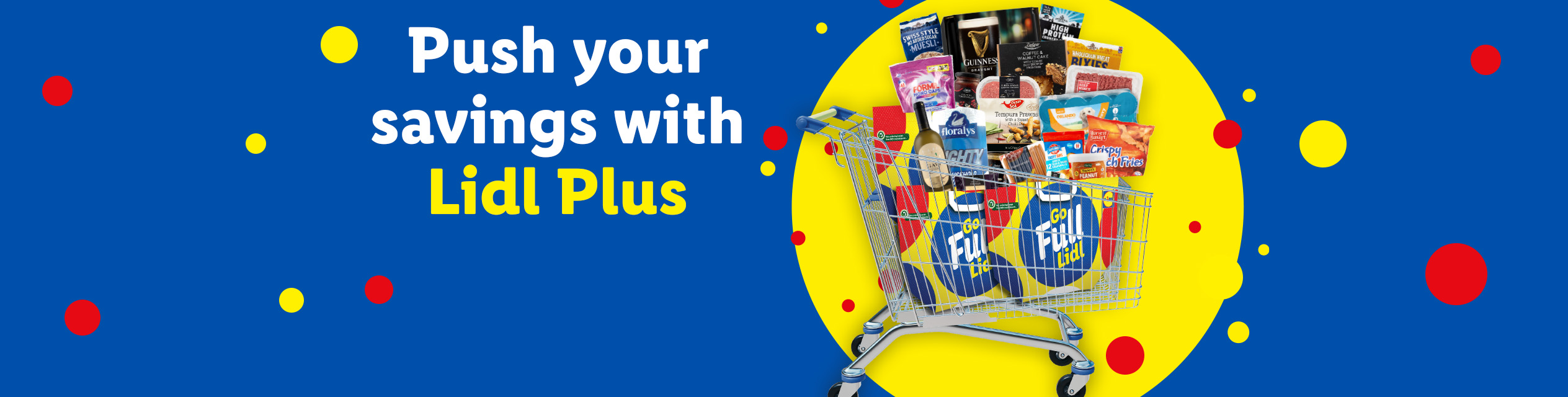A Lidl Plus shopping cart overflowing with groceries, including Guinness, floralys wine, and various frozen foods.