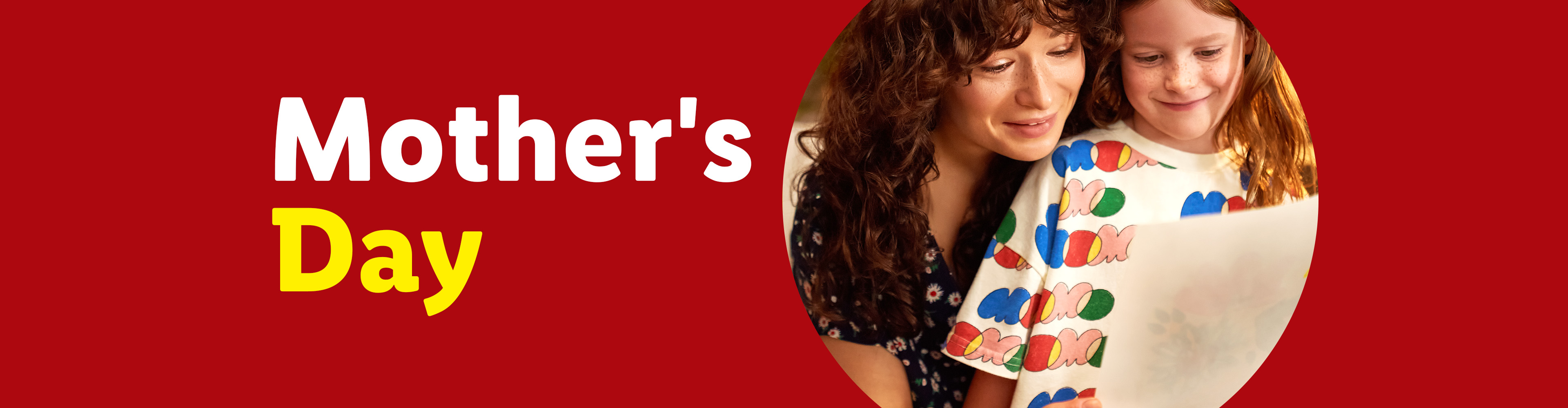 Mother's Day banner with a mother and daughter looking at a drawing.