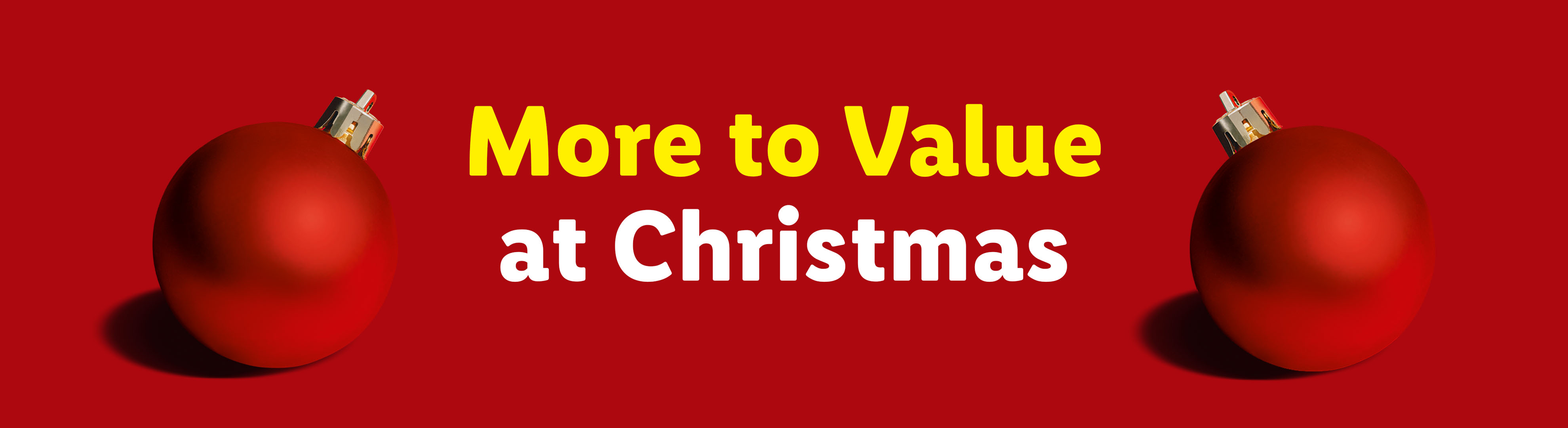 Two red Christmas baubles on a red background with the text 'More to Value at Christmas'.