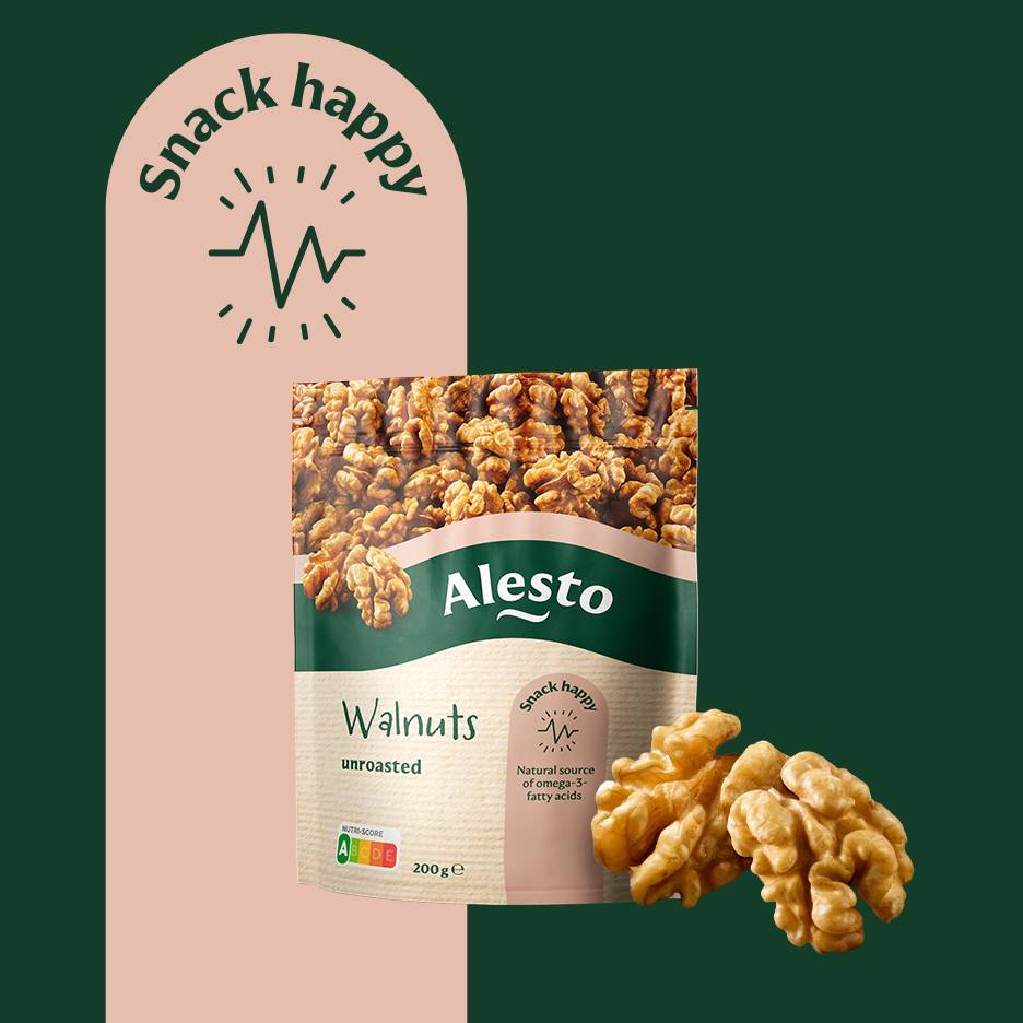 A bag of unroasted walnuts with a 'Snack happy' logo, highlighting omega-3 fatty acids.
