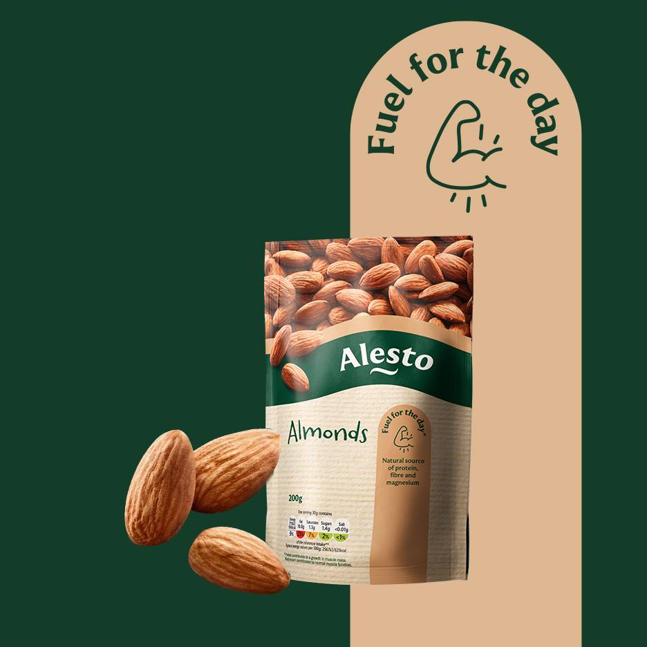 Almonds in a bag with nutritional information and loose almonds, with text 'Fuel for the day'.