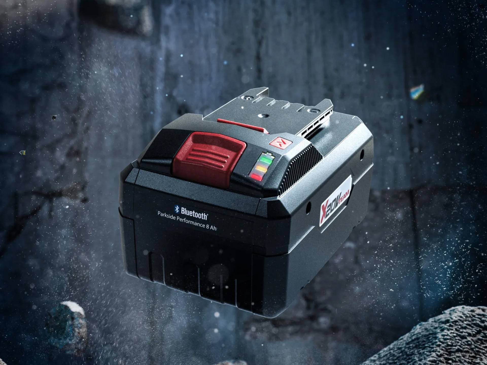Parkside Performance 8 Ah battery with Bluetooth function in a dark, industrial environment.