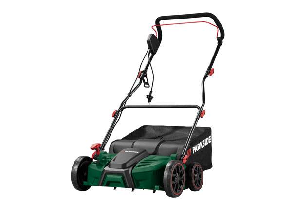 Green electric lawnmower with a black grass collection bag and red accents.