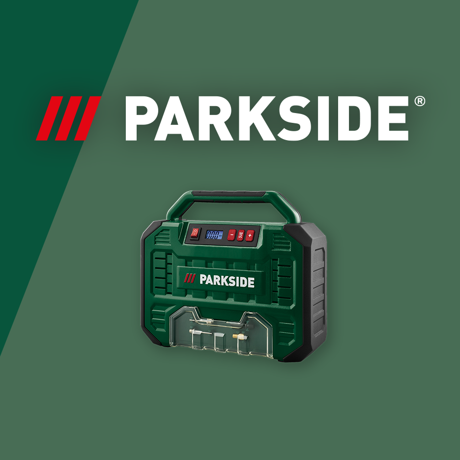 Green portable air compressor with digital display and accessories on a green background.