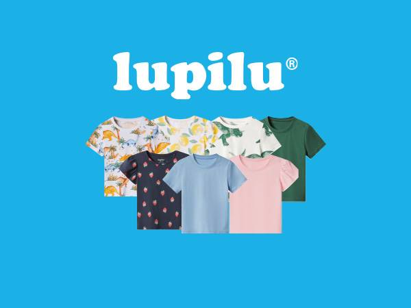 Collection of children's short-sleeved t-shirts in various colors and patterns, including dinosaurs and fruit.