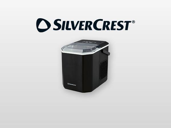 Black ice maker with a clear lid on a light grey background.