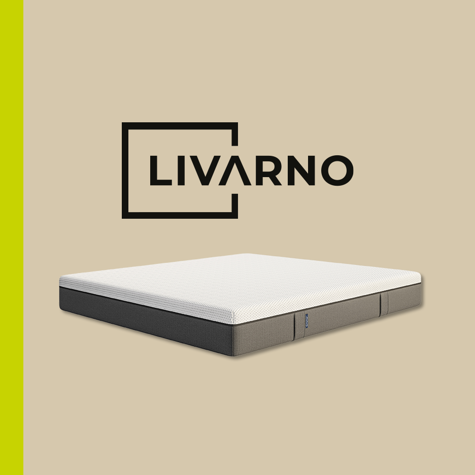 A mattress with a white top and dark grey sides, with a logo above it.