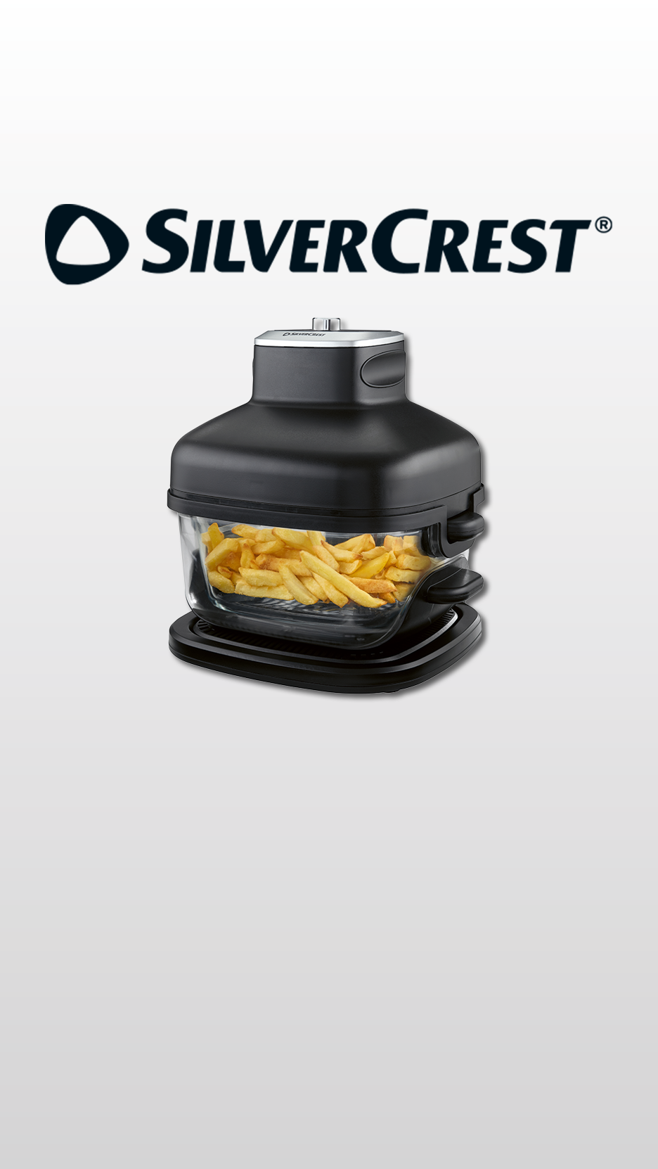 Black air fryer with a glass basket full of golden french fries, on a light gray background.