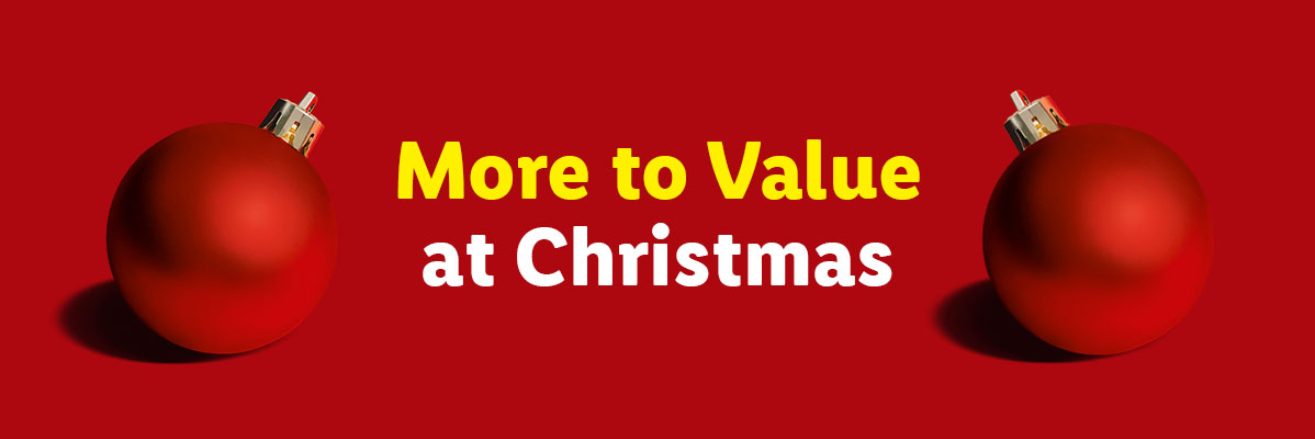 Red Christmas ornaments with text 'More to Value at Christmas' on a red background.