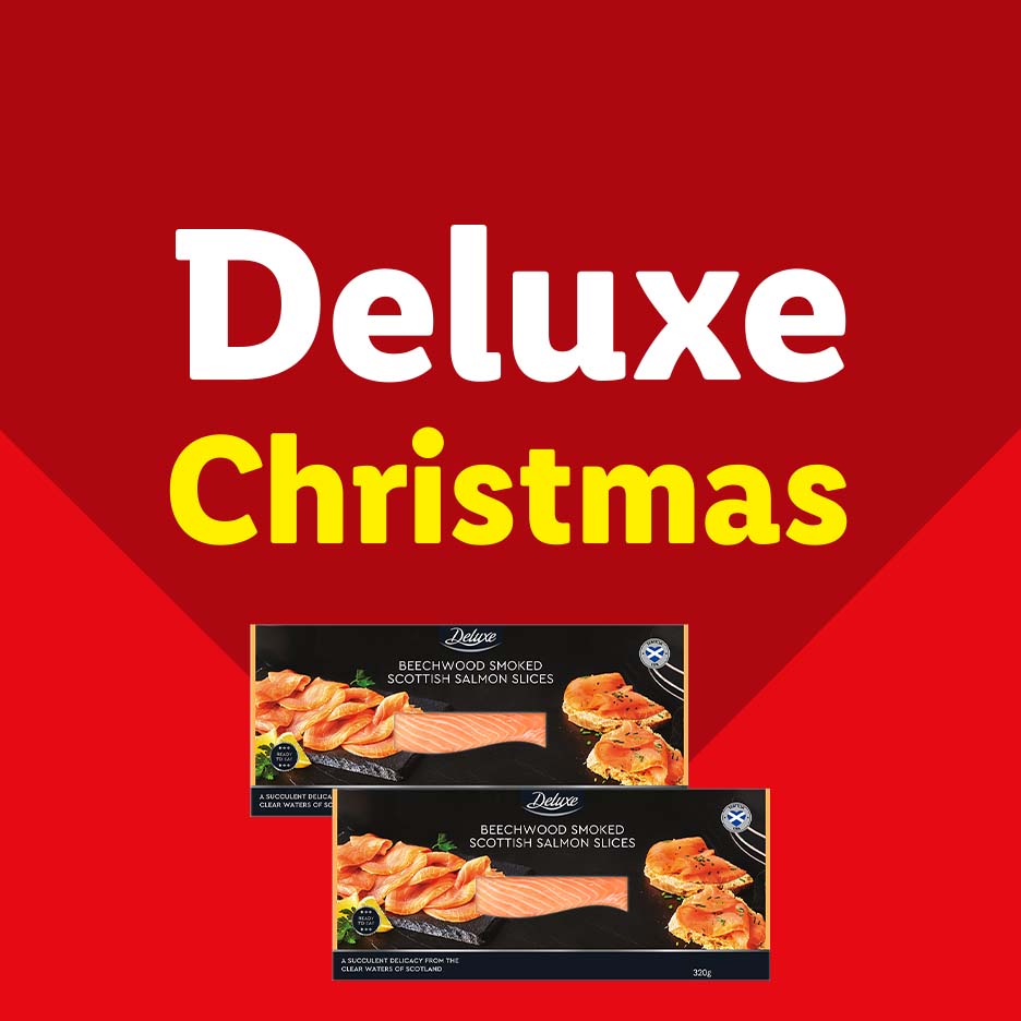 Lidl Deluxe Christmas banner with two packs of salmon fillets.