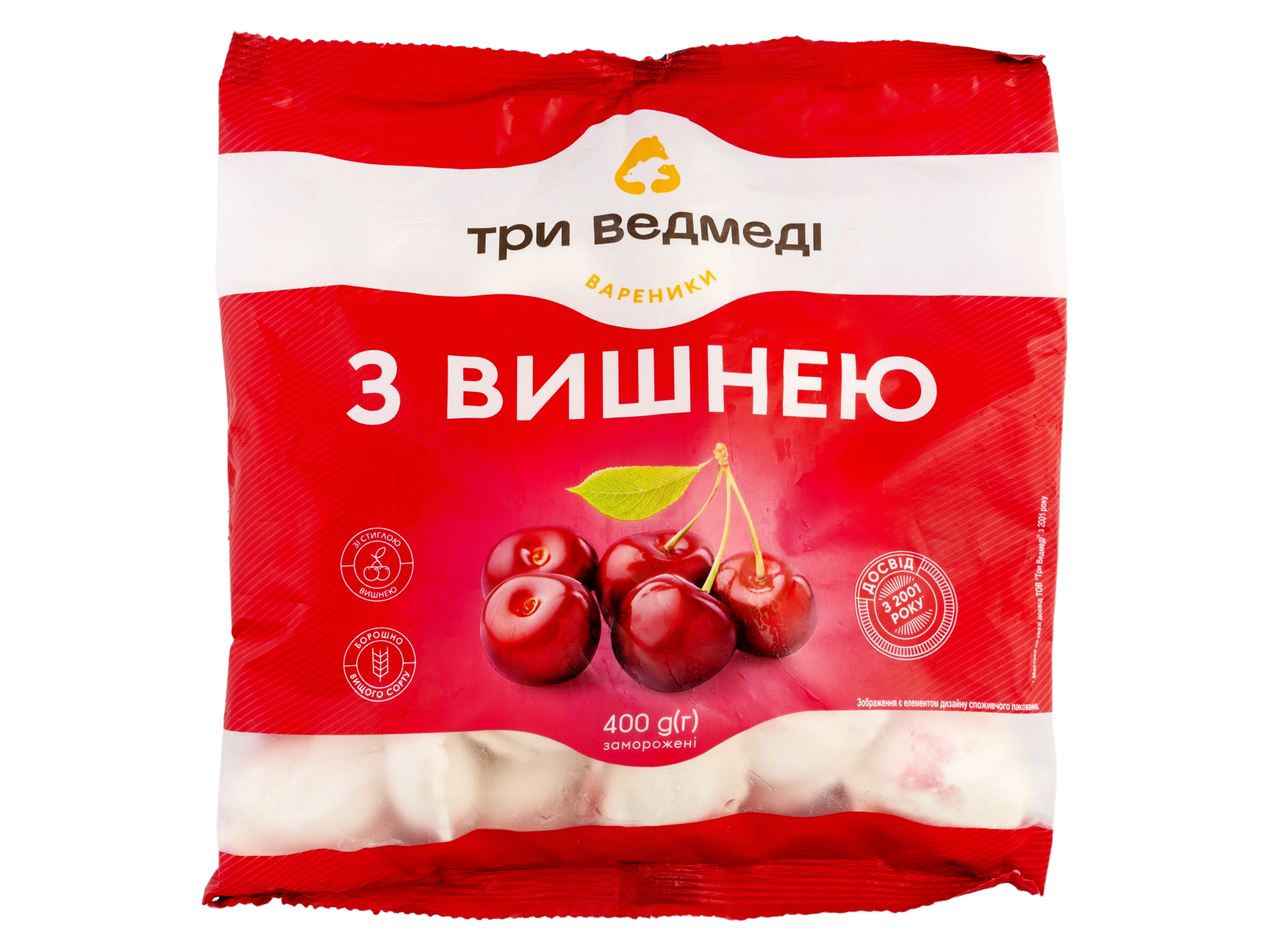Red and white packaging for frozen dumplings with cherries, featuring the brand 'Три Ведмеді' (Three Bears).